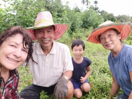 With volunteers at the farm